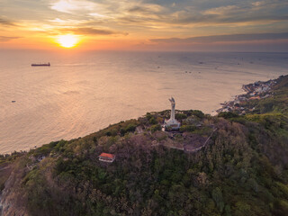 Aerial view of Vung Tau city, Vietnam, panoramic view of the peaceful and beautiful coastal city behind the statue of Christ the King standing on Mount Nho in Vung Tau city.