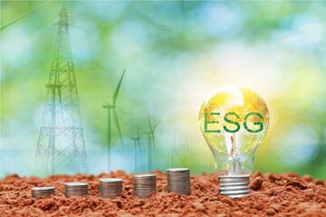 ESG concept in supporting and encouraging people to use natural energy Stacked coins Empty rows...
