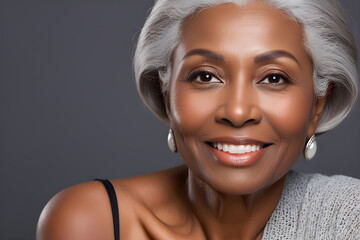 Portrait of a beautiful elderly black woman with gray hair. Cosmetology. Skin care. Taking care of your hair. Beautiful aging - obrazy, fototapety, plakaty