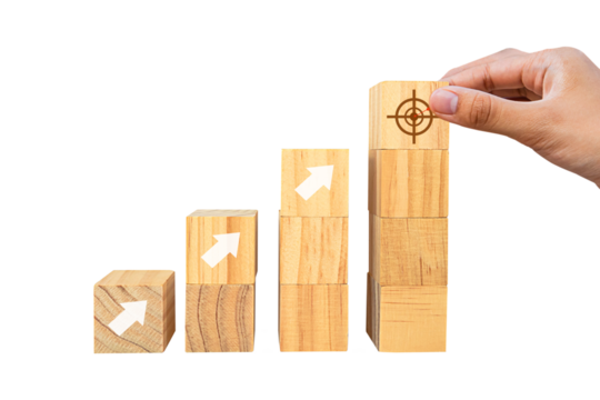 Place wooden blocks as a step towards the goal. Business ideas for successful growth process.PNG