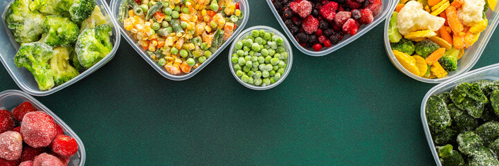 Food in winter, freezing fresh vegetables in summer in the refrigerator, various frozen vegetables in plastic dishes above and below green background, banner - obrazy, fototapety, plakaty