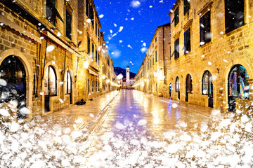 Famous Stradun street in Dubrovnik night winter snow view - obrazy, fototapety, plakaty