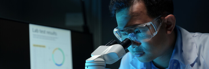 Biochemical research scientists are conducting research in a medical laboratory working with...