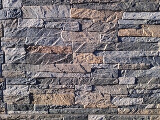 Brick wall color background, stone tiles.