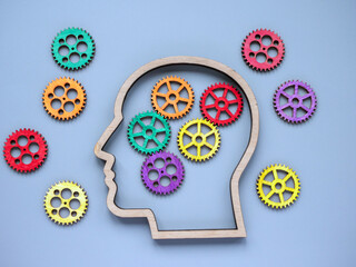 Autism and neurodiversity concept. Head and colored gears.