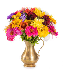 autumn bouquet isolated on white background. zinnias, asters in an antique copper vase