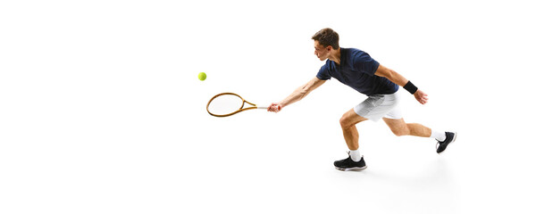Top view. Concentrated man in his 30s, tennis athlete in motion during game,. practicing isolated over white background. Concept of professional sport, competition, game, math, hobby, action