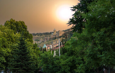 Obraz premium Georgia Tbilisi city view at sunset on a sunny autumn day