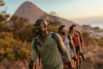 Young people hiking in the mountains