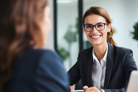 Step into the world of Human Resources as this captivating photo showcases a Human Resources Analyst conducting a job interview. With attentive listening and note-taking