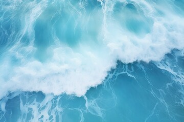 Stunning aerial top view background image of ocean sea water, white waves splashing in the deep sea.