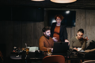 Business team working late night on a project for business growth and sales strategy.