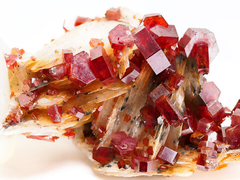 macro close up of natural vanadinite crystals on white background