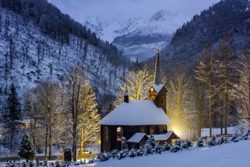 Papier Peint photo autocollant Tatras  Church of St. Anne in Tatranska Javorina, Slovakia at night in winter scenery