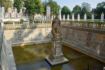 Fotobehang Fountain near Basilica of Archangel Michael and St. Bishop Stanislav in Krakow, Poland © Bogdan Barabas