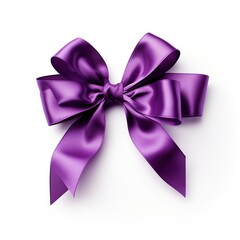 Purple ribbon bow with white polka dots on it isolated on white background