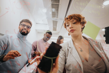 Successful teamwork in a pleasant atmosphere focusing on project planning and problem-solving.