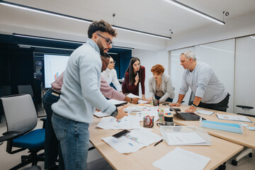 Business professionals collaborating and brainstorming ideas in a classroom setting.