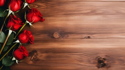 Naklejka na ściany i meble Elegant Red Roses Lying on a Rich Wooden Texture Background Perfect for Romantic Occasions and Valentine's Day Greetings