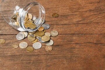 Retro wood desk table with money coins