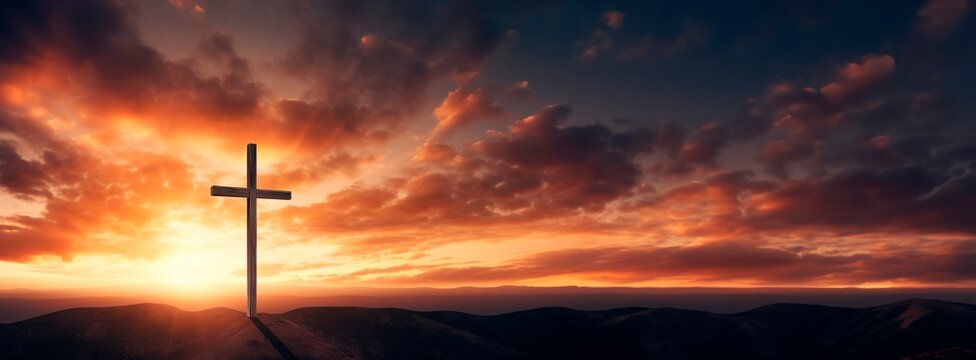 Crucifixion Of Jesus Christ At Sunrise -a christian cross on top of a Hill at sunset, easter and christian concept, horizontal background, copy space for text