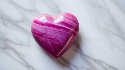 Top View of a magenta Heart on a white Marble Background. Romantic Backdrop with Copy Space