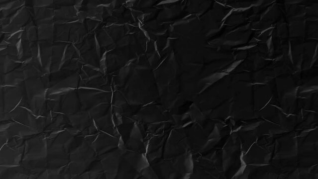 Wrinkled old black paper texture background looped animation design template blank with place for text 