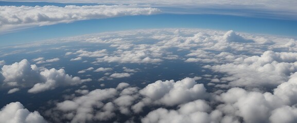 Aerial View of Fluffy Clouds in a Blue Sky, Aerial of airplane in blue sky with fluffy white clouds. "A mesmerizing aerial view of fluffy clouds floating against a serene blue sky."