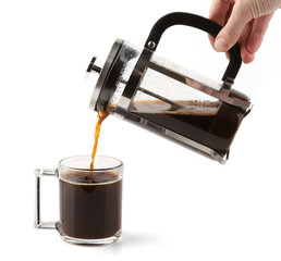 French press coffee maker pouring coffee into cup isolated on white background. Mechanical coffee...