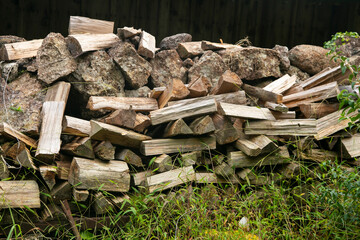 Cutted wood piled up in a warehouse in rural Japan.
