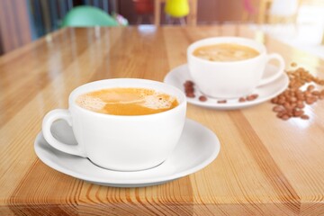 Tasty fresh coffee in a cup with cream