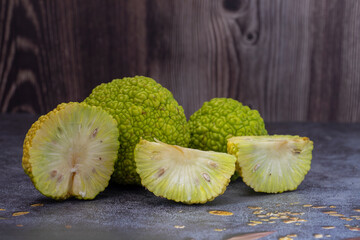 The fruit of the False Orange Tree, Maclura pomifera, is a large-crowned tree species from the...