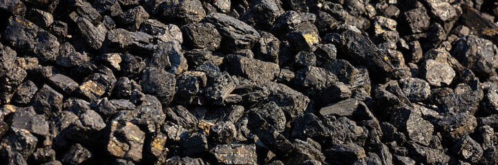 Lumps of coal with pyrite coating. Pyrite is called fool's gold.