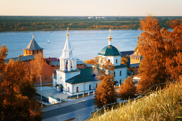 View of the Volga, the Temple of Simeon the Stylite in the Kremlin in golden autumn. Nizhny...