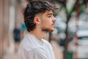 portrait of young attractive man on the street
