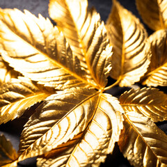 Stylized leaves under gold, golden beautiful leaves