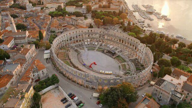 Aerial view of the historic Roman Amphitheatre of Pula at sunset, Croatia