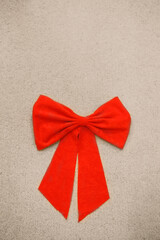 Red bow on a light background