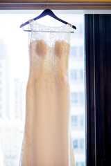 Lace wedding gown in window