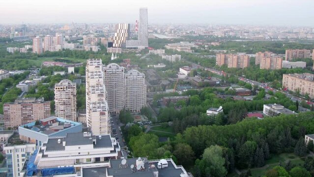 City landscape with boulevards, multi-storey buildings 
