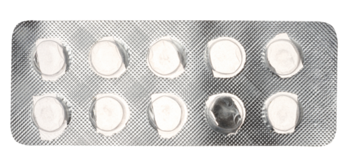 Empty blister pack of round pills on a white isolated background