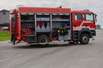 In this captivating scene, a state-of-the-art firetruck, equipped with advanced rescue technology,...