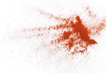 Pile of red paprika powder scattered isolated on white, top view 