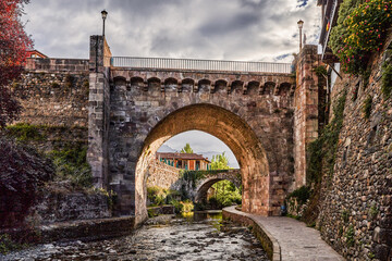 Potes mediaeval town with bridge and Deva river in its path. In the Liebana region, Cantabria, Spain.