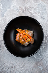 Spring rolls made from rice paper, chicken, zucchini, carrots, sweet peppers and teriyaki sauce.