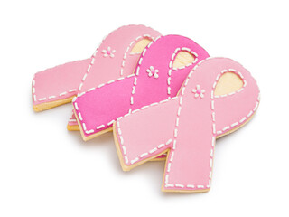 Cookies in shape of pink ribbon on white background. Breast cancer awareness concept