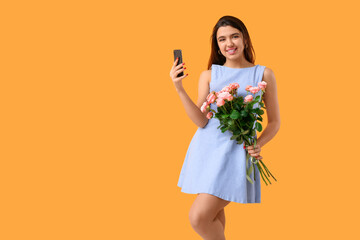 Young woman with mobile phone and roses on yellow background. Online dating concept