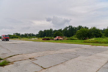 In this captivating scene, a state-of-the-art firetruck, equipped with advanced rescue technology, stands ready with its skilled firefighting team, prepared to intervene and respond rapidly to