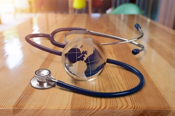 Health Day. Globe and medical Stethoscope