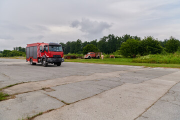 In this captivating scene, a state-of-the-art firetruck, equipped with advanced rescue technology,...